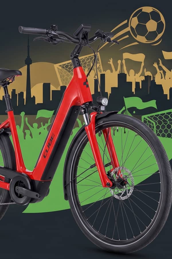 Red electric bike with a world cup -themed background featuring a soccer ball and stadium.slider_item_VzRg8W
